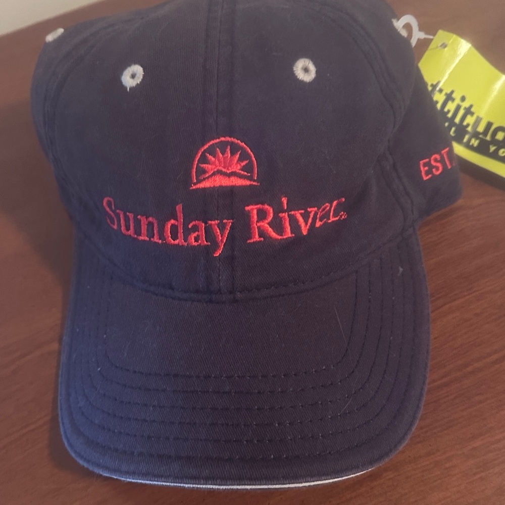 NWT Brand new, never worn Sunday River Navy Blue BaseballCap with Red Embroidery